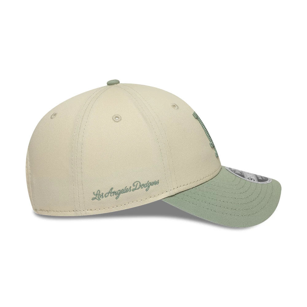Pictured is this MLB Side Script LA Dodgers 9FORTY M-Crown cap in Cream. 5