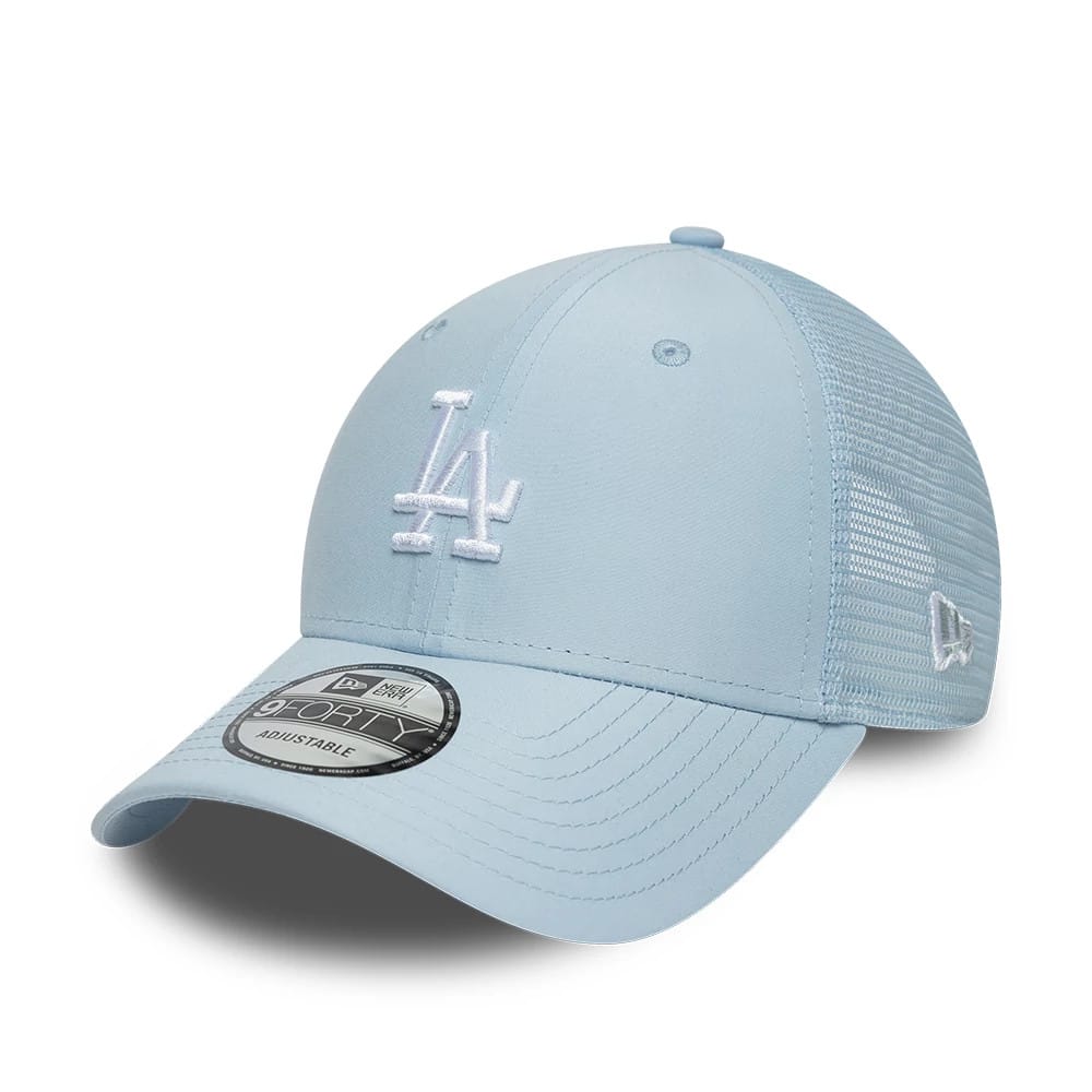 Pictured is this MLB Homefield LA Dodgers 9FORTY Trucker cap in pastel blue. 1