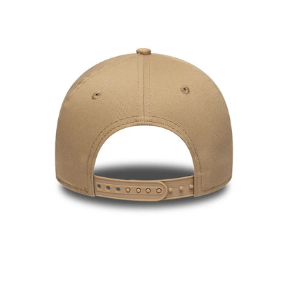 LA Dodgers MLB League Essential Light Beige New Era 9FORTY E-Frame Adjustable Cap, rear view showing the open adjustable strap with multiple holes, matching light beige fabric across the structured crown, and small embroidered eyelets.