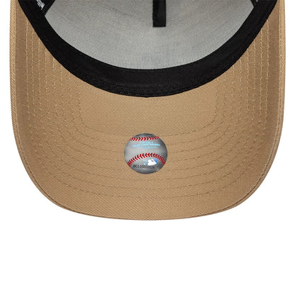 LA Dodgers MLB League Essential Light Beige New Era 9FORTY E-Frame Adjustable Cap, inside view showing the black lined sweatband, grey undervisor with a structured panel design, and a baseball-themed sticker on the light beige bottom visor.
