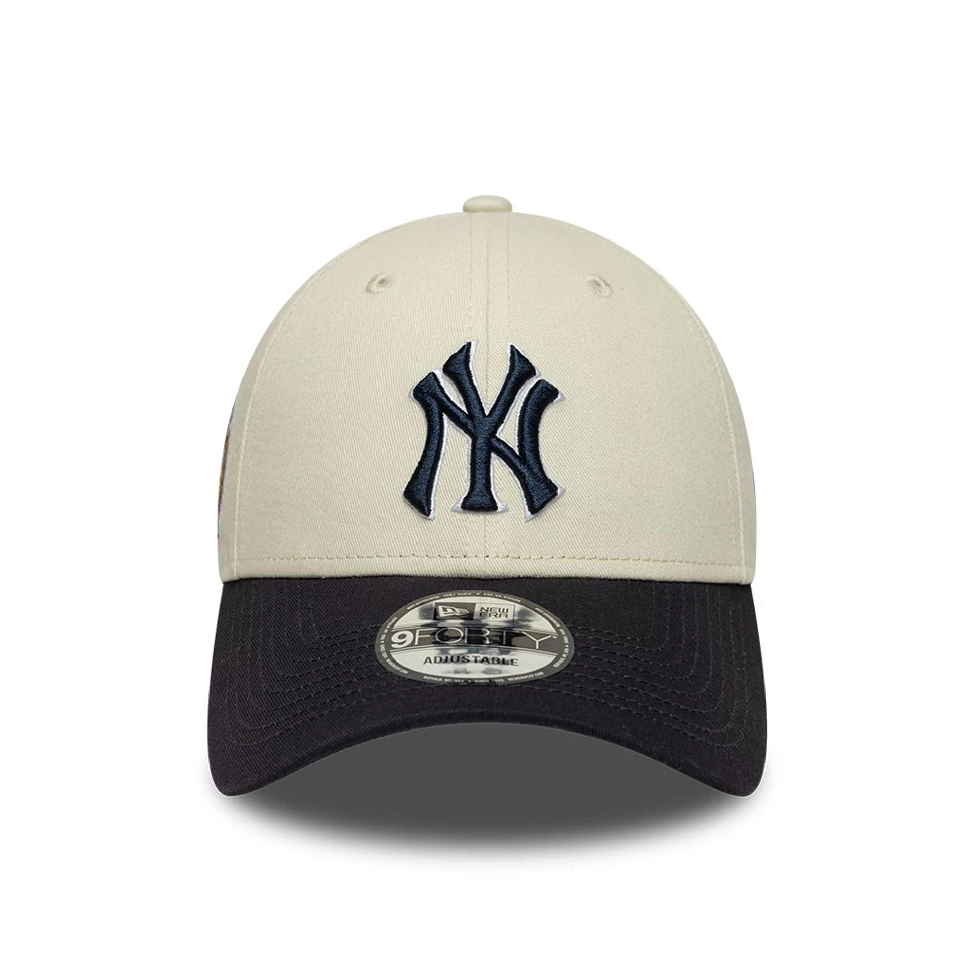 Pictured is this MLB World Series Patch New York Yankees 9FORTY cap in Cream. 2