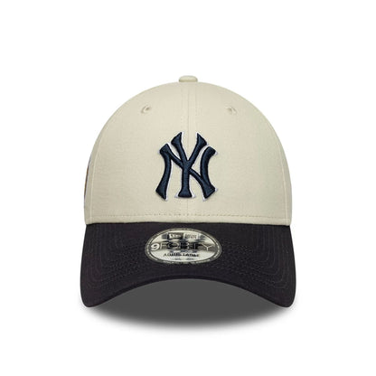Pictured is this MLB World Series Patch New York Yankees 9FORTY cap in Cream. 2