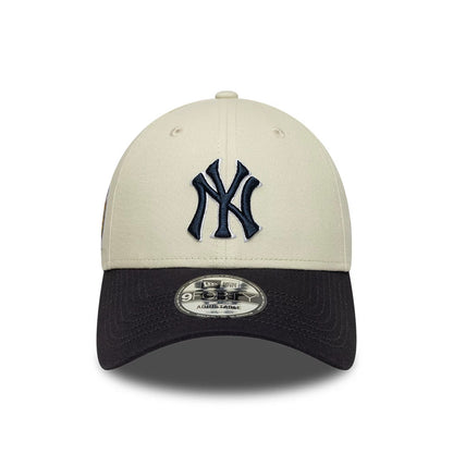 Pictured is this MLB World Series Patch New York Yankees 9FORTY cap in Cream. 2