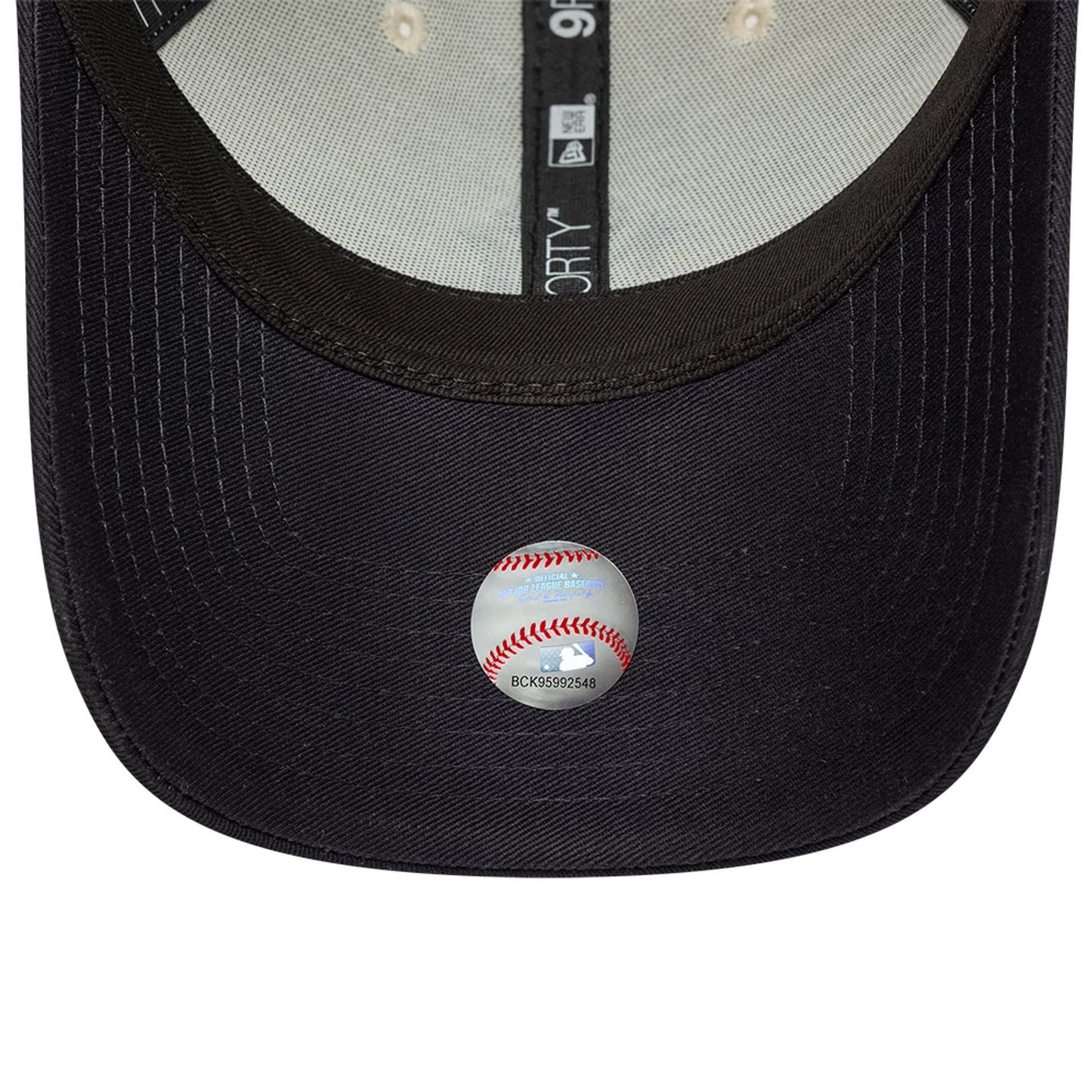 Pictured is this MLB World Series Patch New York Yankees 9FORTY cap in Cream. 6
