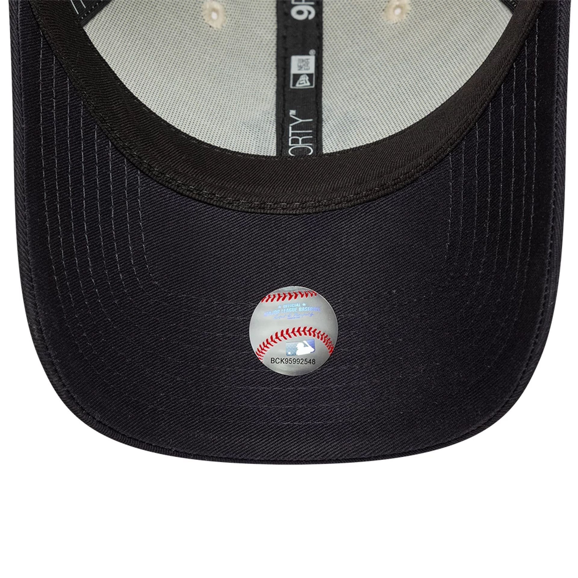 Pictured is this MLB World Series Patch New York Yankees 9FORTY cap in Cream. 6