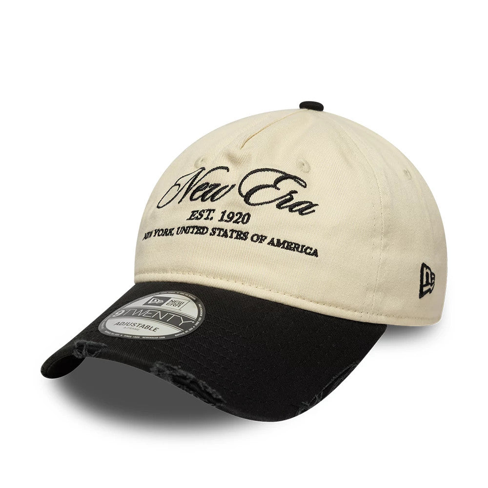 Pictured is this New Era Wash Distress 9TWENTY A-Frame cap in light beige. 1