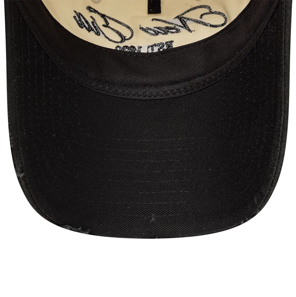 New Era Wash Distress Light Beige New Era 9TWENTY A-Frame Adjustable Cap, inside view showing the light beige underbrim with a embroidered signature, black sweatband, and black interior taping.