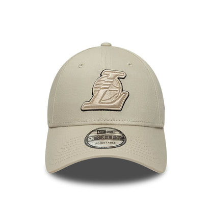 Pictured is this NBA Team Outline LA Lakers 9FORTY cap in Cream. 2