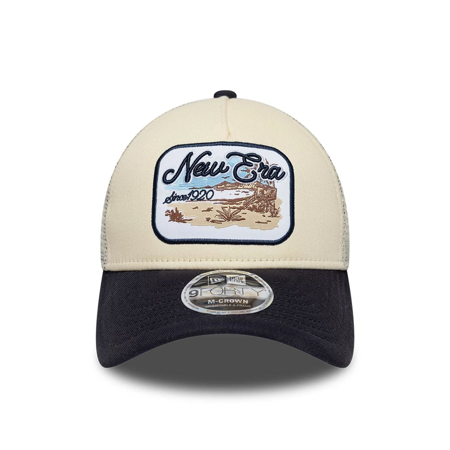 Pictured is this New Era 9FORTY M-Crown A-Frame Trucker cap in light beige. 2