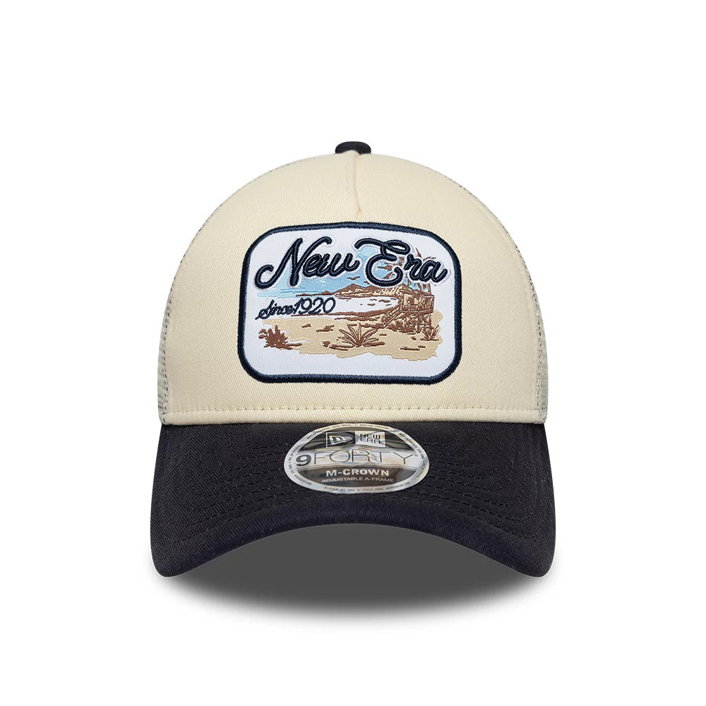 Pictured is this New Era 9FORTY M-Crown A-Frame Trucker cap in light beige. 2