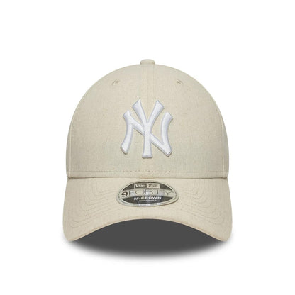Pictured is this MLB Linen New York Yankees 9FORTY M-Crown cap in Cream. 2