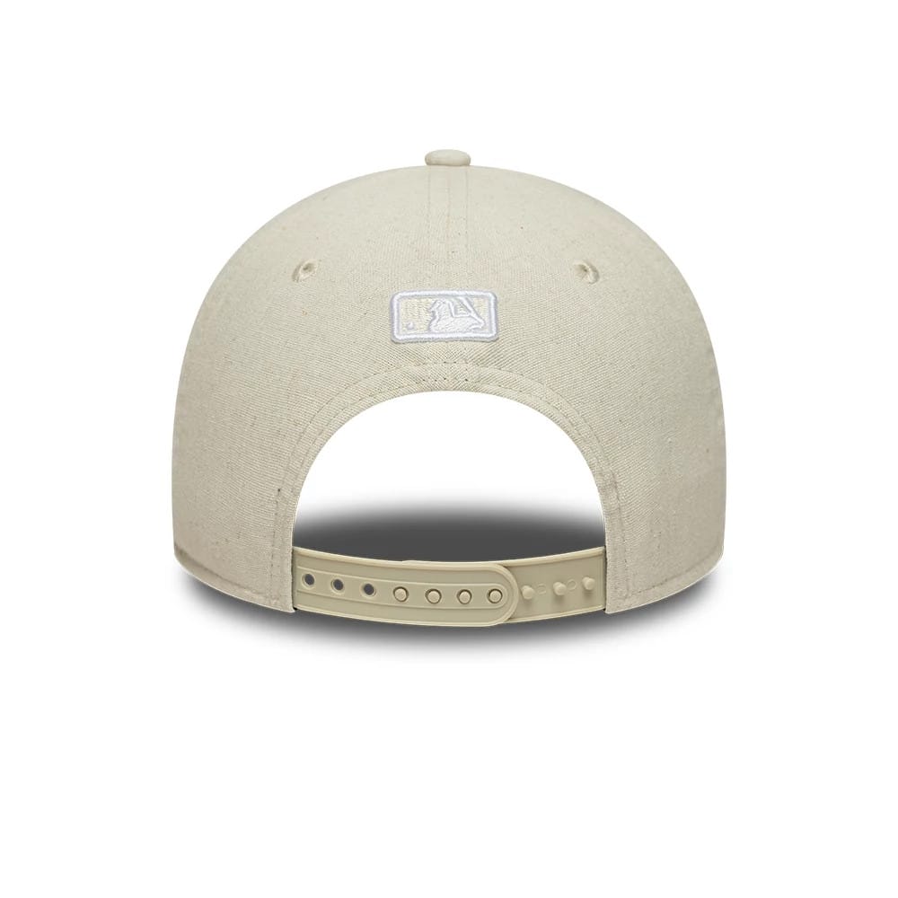 Pictured is this MLB Linen New York Yankees 9FORTY M-Crown cap in Cream. 4