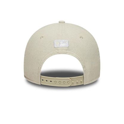 Pictured is this MLB Linen New York Yankees 9FORTY M-Crown cap in Cream. 4