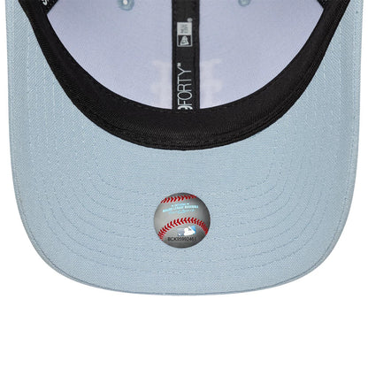 New York Mets MLB Linen Pastel Blue New Era 9FORTY M-Crown Adjustable Cap, inside view showing light blue undervisor with a transparent MLB size sticker featuring a baseball graphic, black sweatband, and branded taping along the interior seams.
