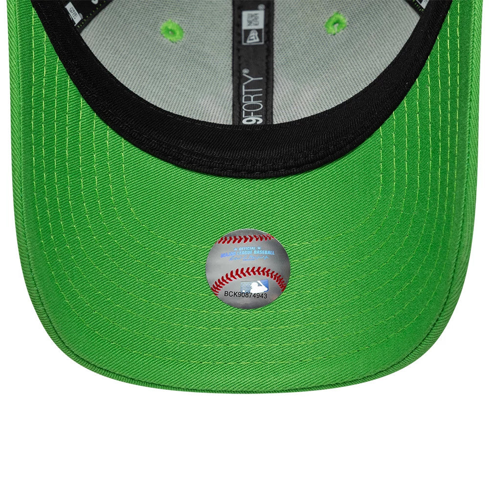 New York Yankees MLB League Essential Open Green New Era 9FORTY Adjustable Cap, inside view showing a black sweatband with 9FORTY label, bright green undervisor, and MLB holographic sticker centralized on the green fabric.
