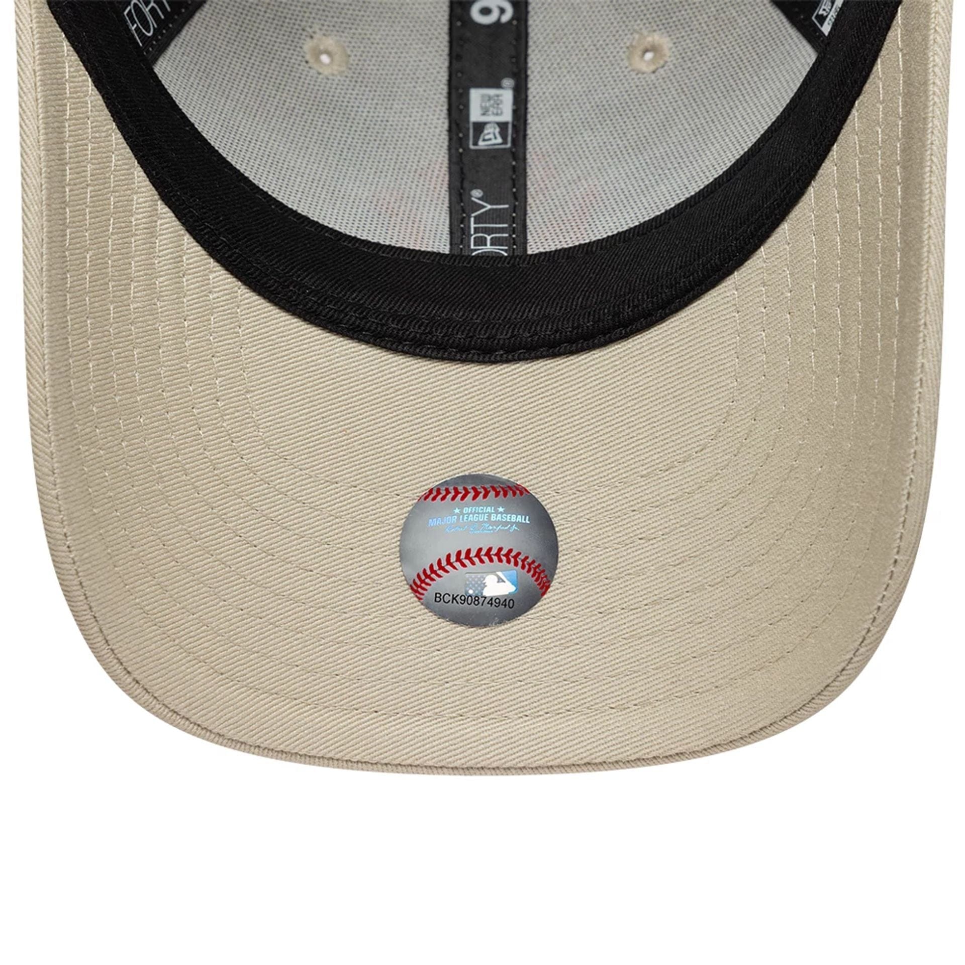 Pictured is this Youth MLB League Essential New York Yankees 9FORTY cap in light beige. 5