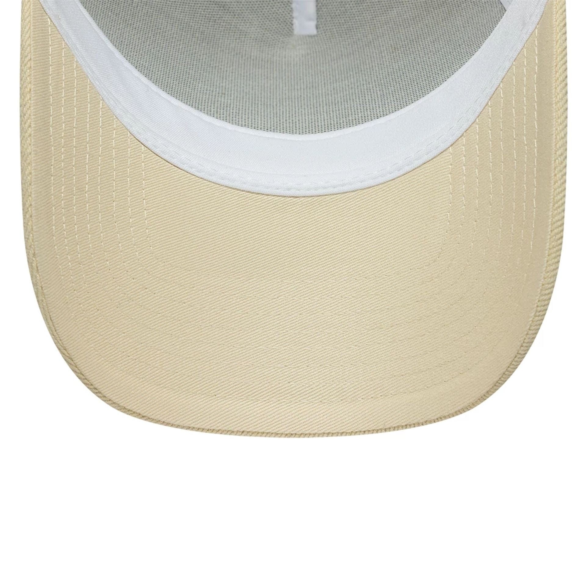 Pictured is this New Era Leather Patch 9FORTY A-Frame Trucker cap in light beige. 5