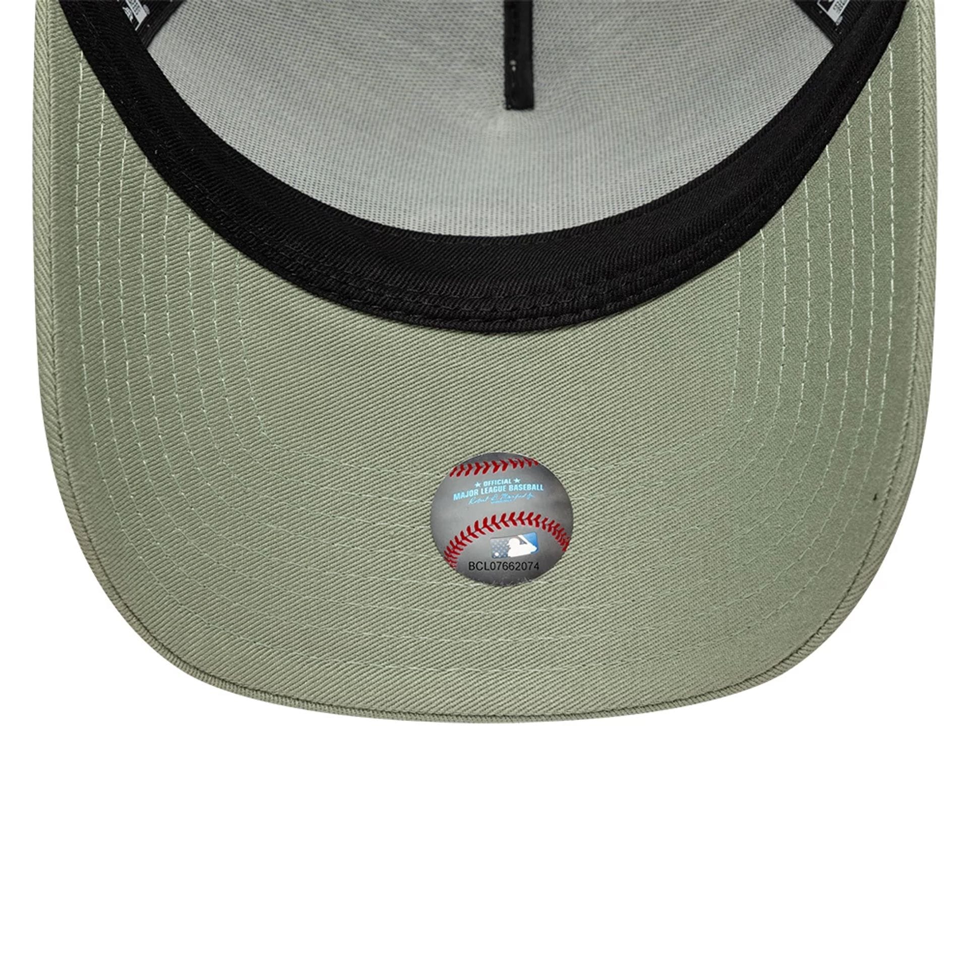 Pictured is this MLB Outline LA Dodgers 9FORTY E-Frame Trucker cap in pastel green. 5