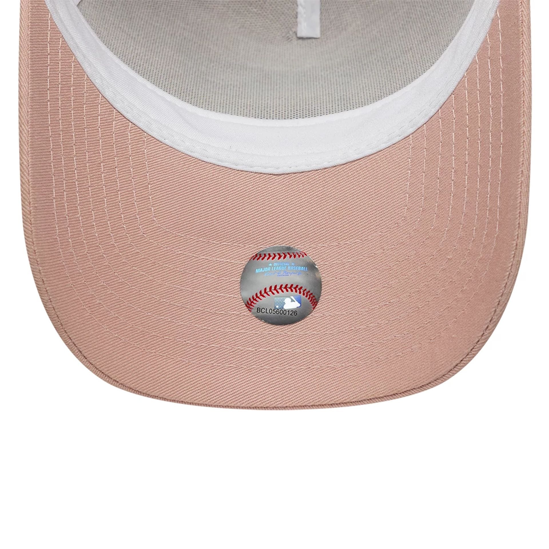 Pictured is this MLB Outline New York Yankees 9FORTY E-Frame Trucker cap in pastel pink. 5