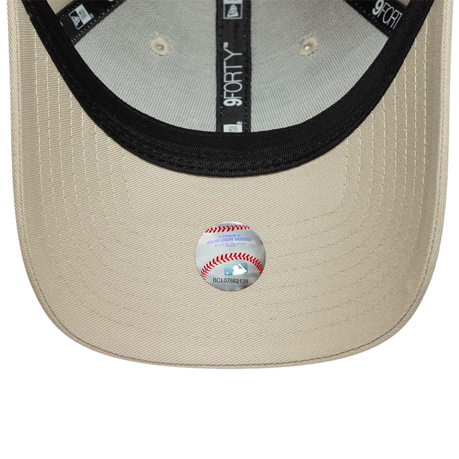 Pictured is this Womens MLB League Essential LA Dodgers 9FORTY cap in light beige. 5