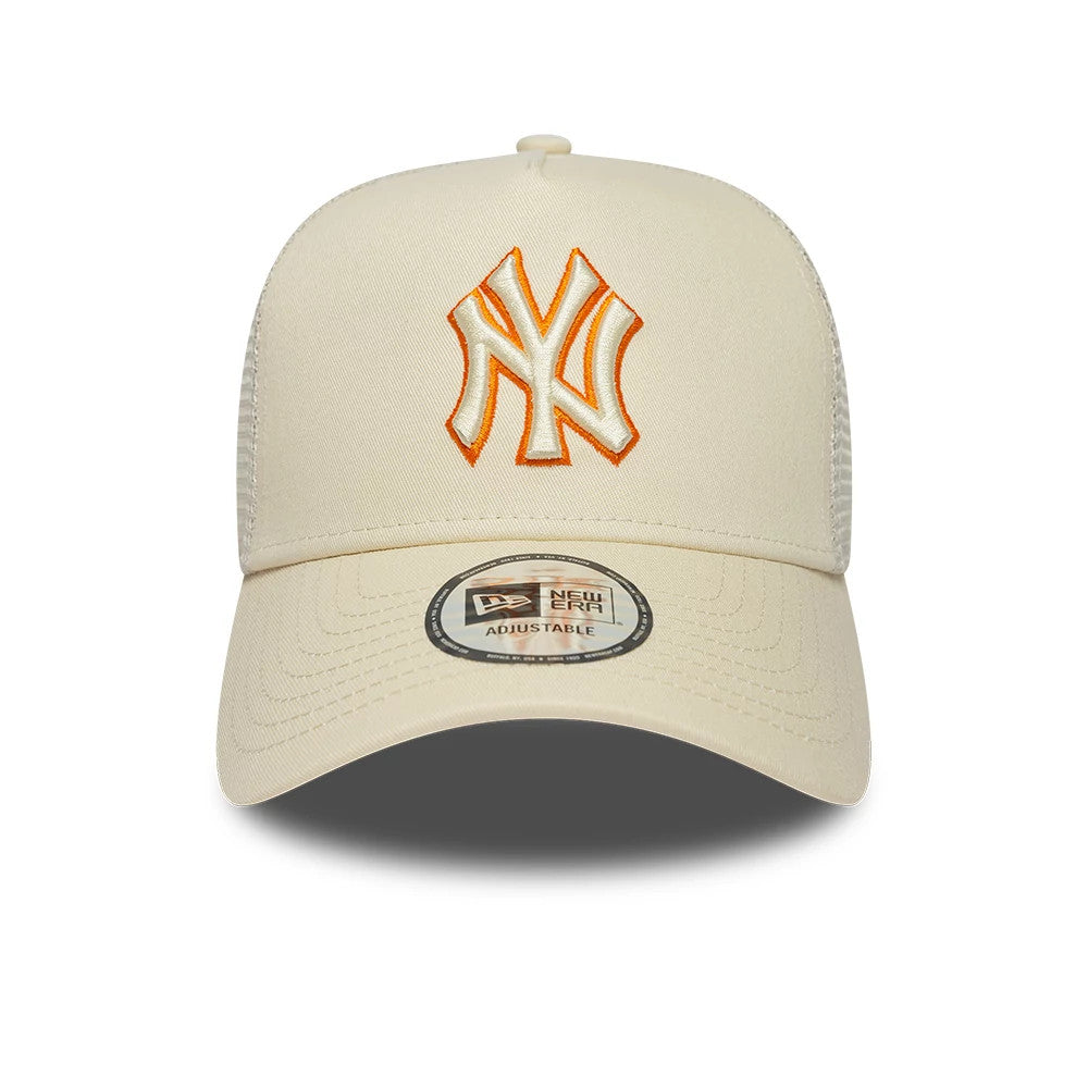 New York Yankees MLB Outline Cream New Era 9FORTY E-Frame Trucker Adjustable Cap, front view showing the raised embroidered New York Yankees logo in white with orange outline on the cream front panel.