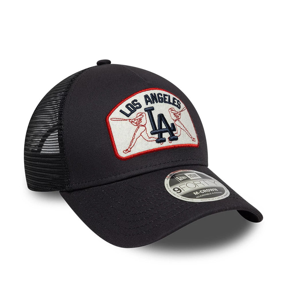 Pictured is this MLB Patch LA Dodgers 9FORTY M-Crown A-Frame Trucker cap in navy. 3