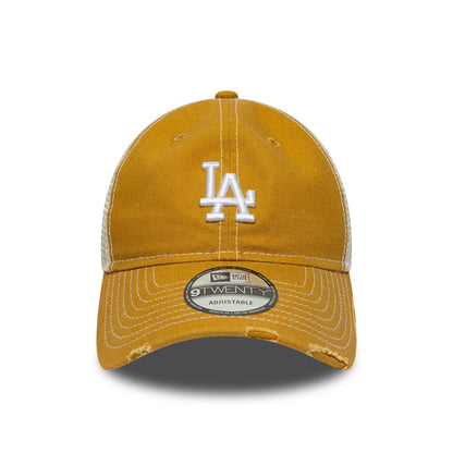 LA Dodgers MLB Cotton Canvas Beige New Era 9TWENTY Trucker Adjustable Cap, front view showing a white raised embroidered LA logo on the front panel, with a curved visor and a 9TWENTY size sticker on the visor.
