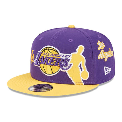 Pictured is this NBA Hardwood Classic All Star Game LA Lakers 9FIFTY Snapback cap in purple. 1
