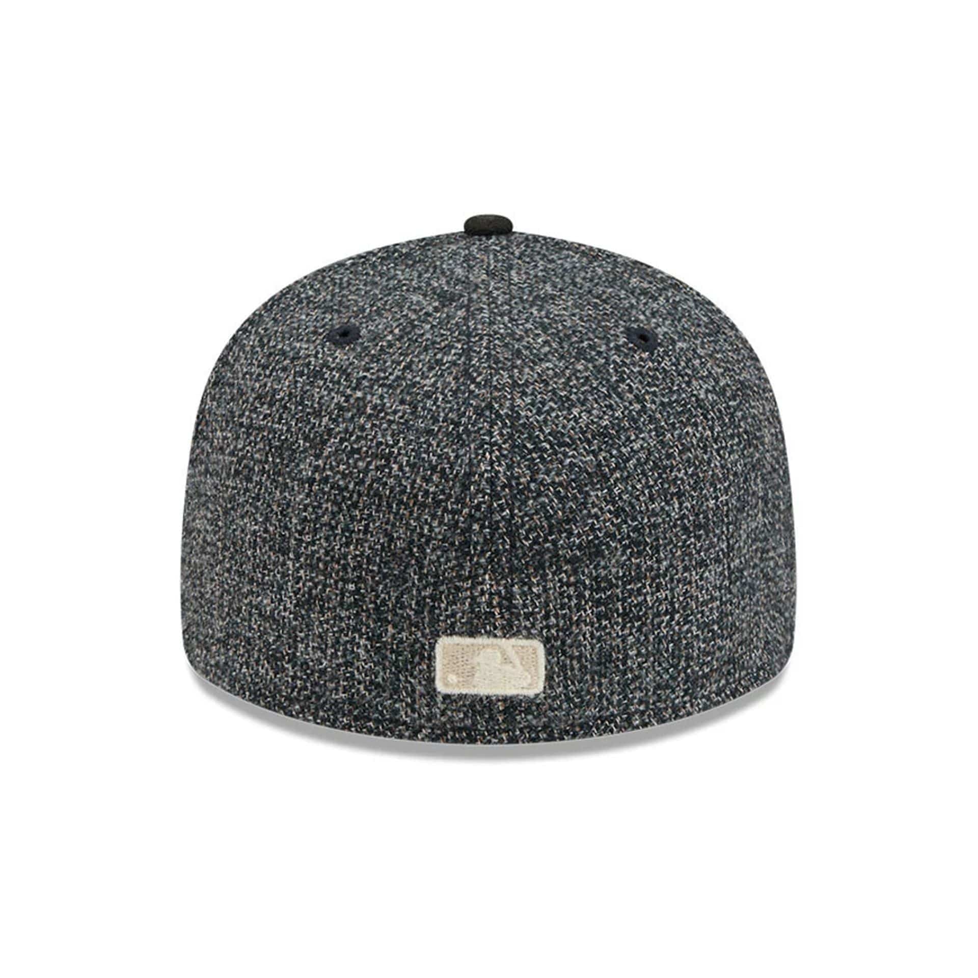 Pictured is this MLB Tweedy Cotton Chicago Cubs 59FIFTY Fitted cap in black. 7