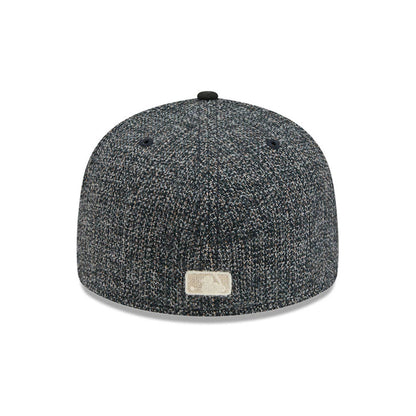 Pictured is this MLB Tweedy Cotton Chicago Cubs 59FIFTY Fitted cap in black. 7