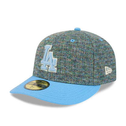 LA Dodgers MLB Tweedy Cotton Pastel Blue New Era 59FIFTY Fitted Cap, three-quarter view showing raised light blue LA embroidery on the front panel, light blue visor with a gold 59FIFTY size sticker, and New Era flag logo on the left side.