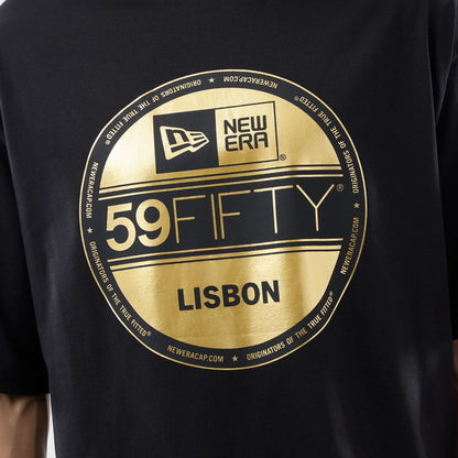 The model is wearing this New Era Sticker Lisbon Oversized T-Shirt in black. 4