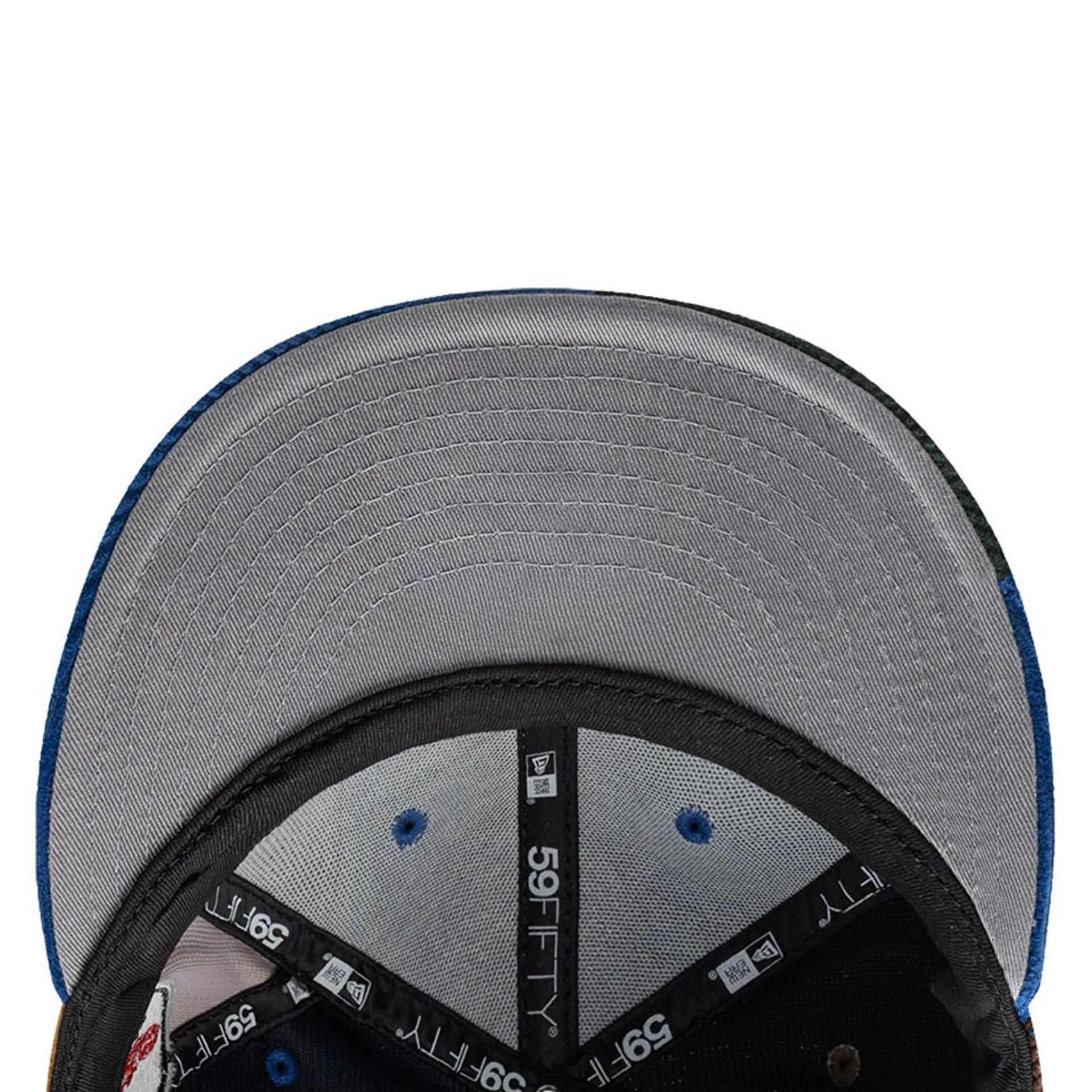 Pictured is this MLB Patchwork LA Dodgers 59FIFTY Fitted cap in dark blue. 2