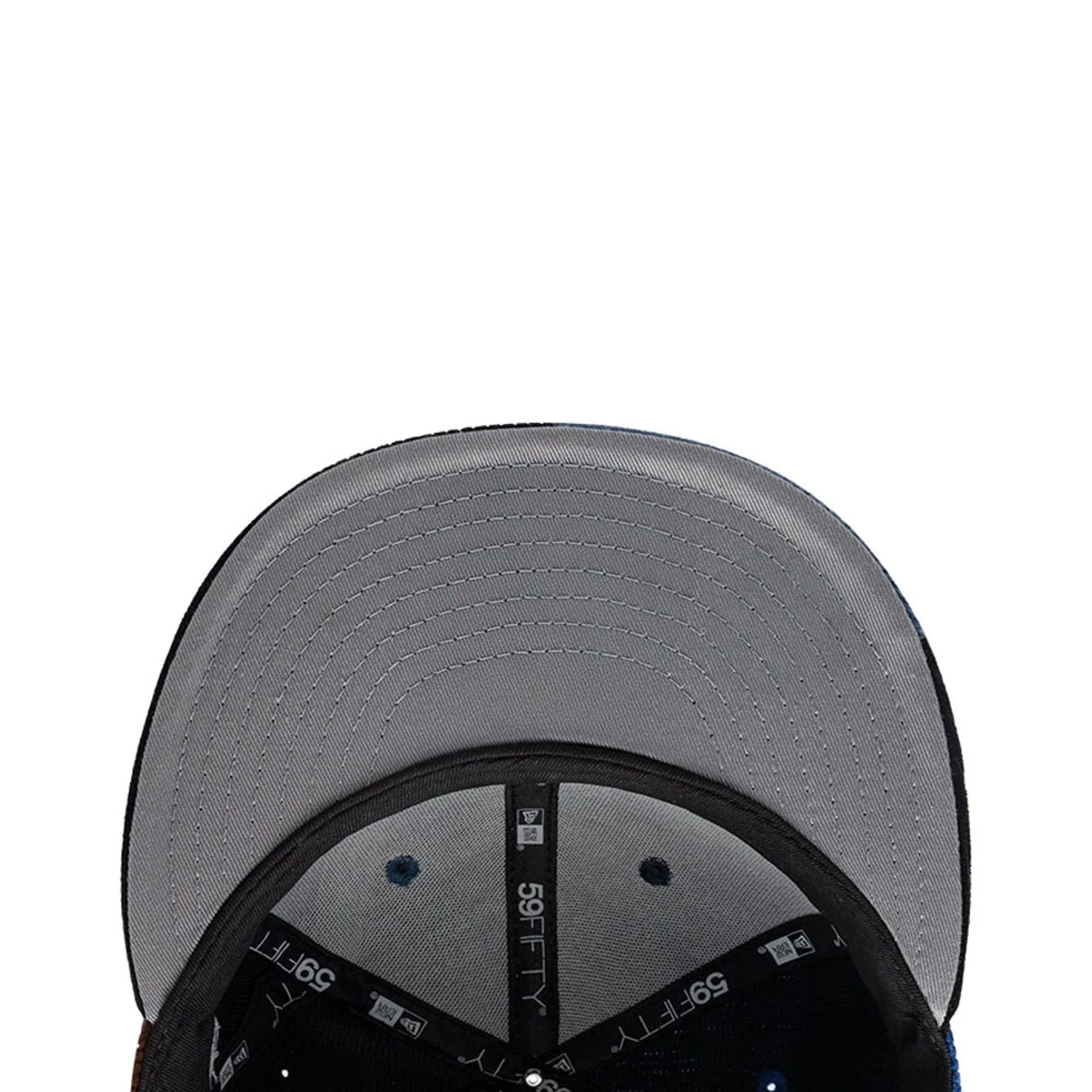 Pictured is this MLB Patchwork New York Yankees 59FIFTY Fitted cap in navy. 2