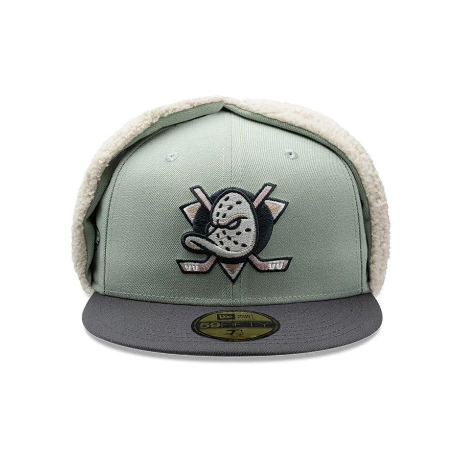Pictured is this NHL Patch Anaheim Ducks Dogear 59FIFTY Fitted cap in pastel green. 6