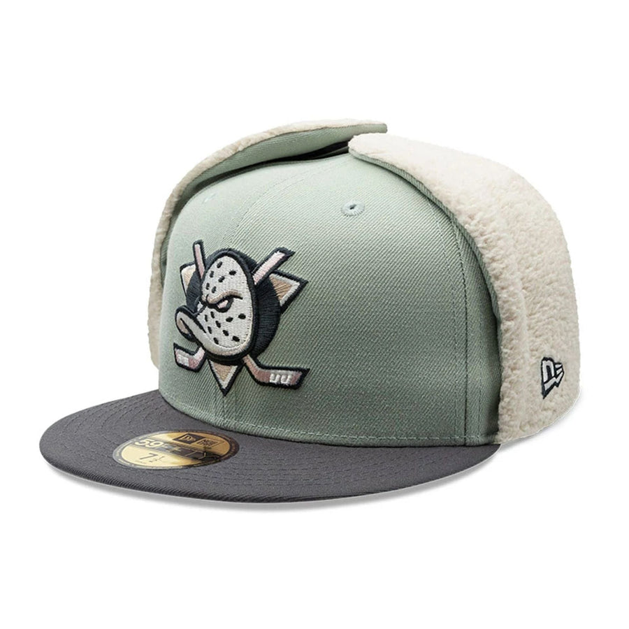 Pictured is this NHL Patch Anaheim Ducks Dogear 59FIFTY Fitted cap in pastel green. 5