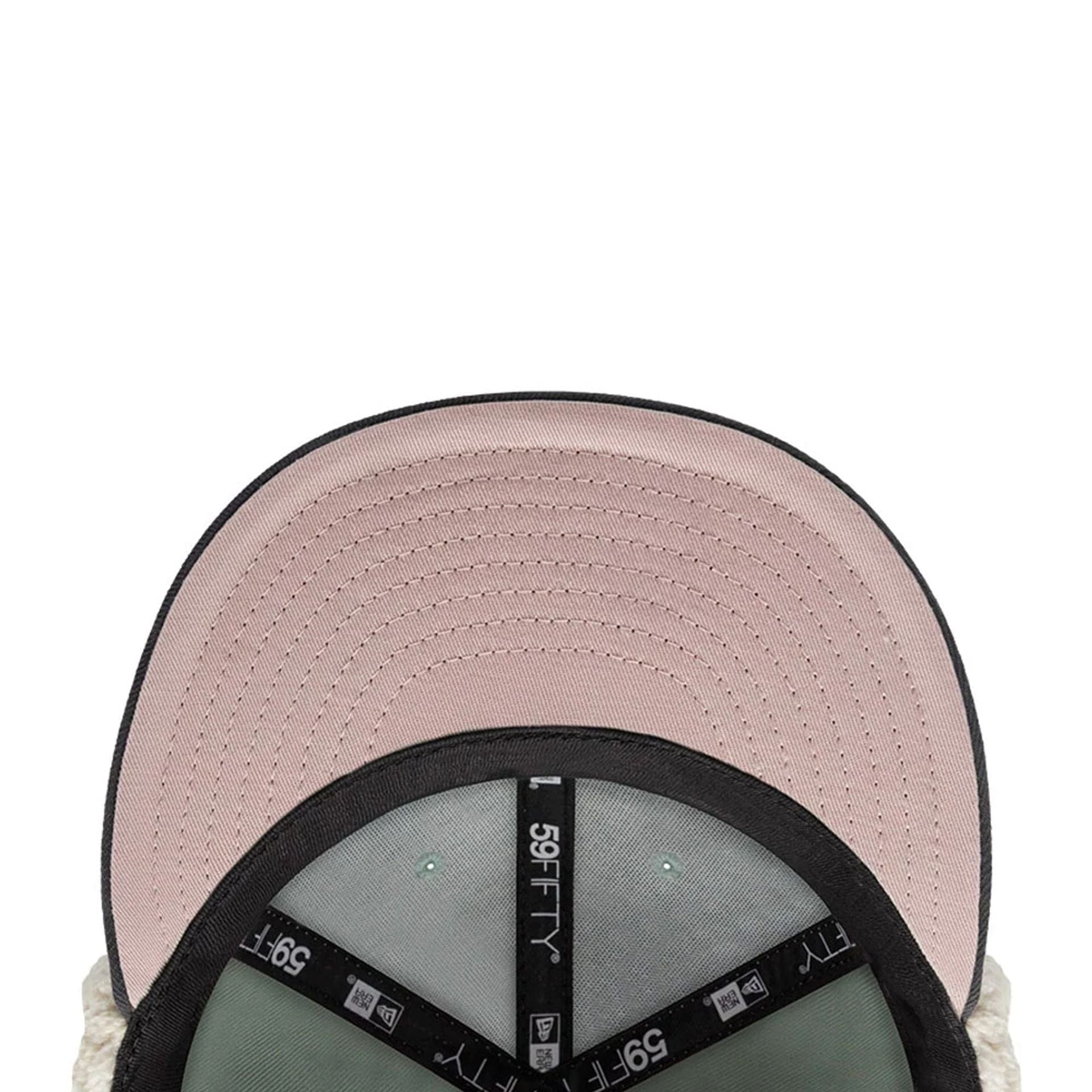 Pictured is this NHL Patch Anaheim Ducks Dogear 59FIFTY Fitted cap in pastel green. 3