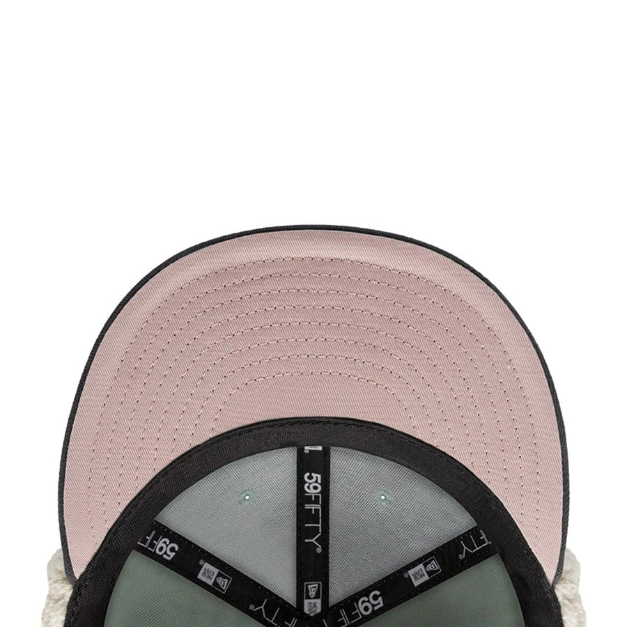 Pictured is this NHL Patch Anaheim Ducks Dogear 59FIFTY Fitted cap in pastel green. 3