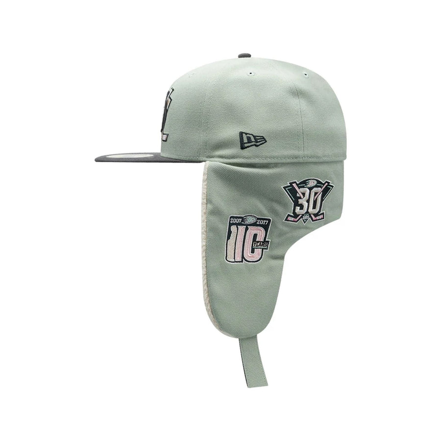 Pictured is this NHL Patch Anaheim Ducks Dogear 59FIFTY Fitted cap in pastel green. 10