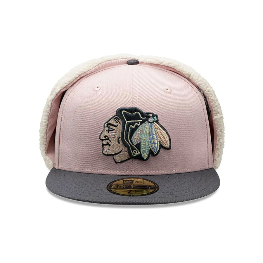 Pictured is this NHL Patch Chicago Blackhawks Dogear 59FIFTY Fitted cap in pastel pink. 3