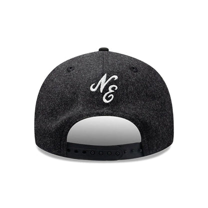 Pictured is this New Era Melton Wool Retro Crown 9FIFTY cap in black. 4