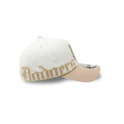 Pictured is this MLB Gothic Script LA Dodgers 9FORTY A-Frame cap in white. 4