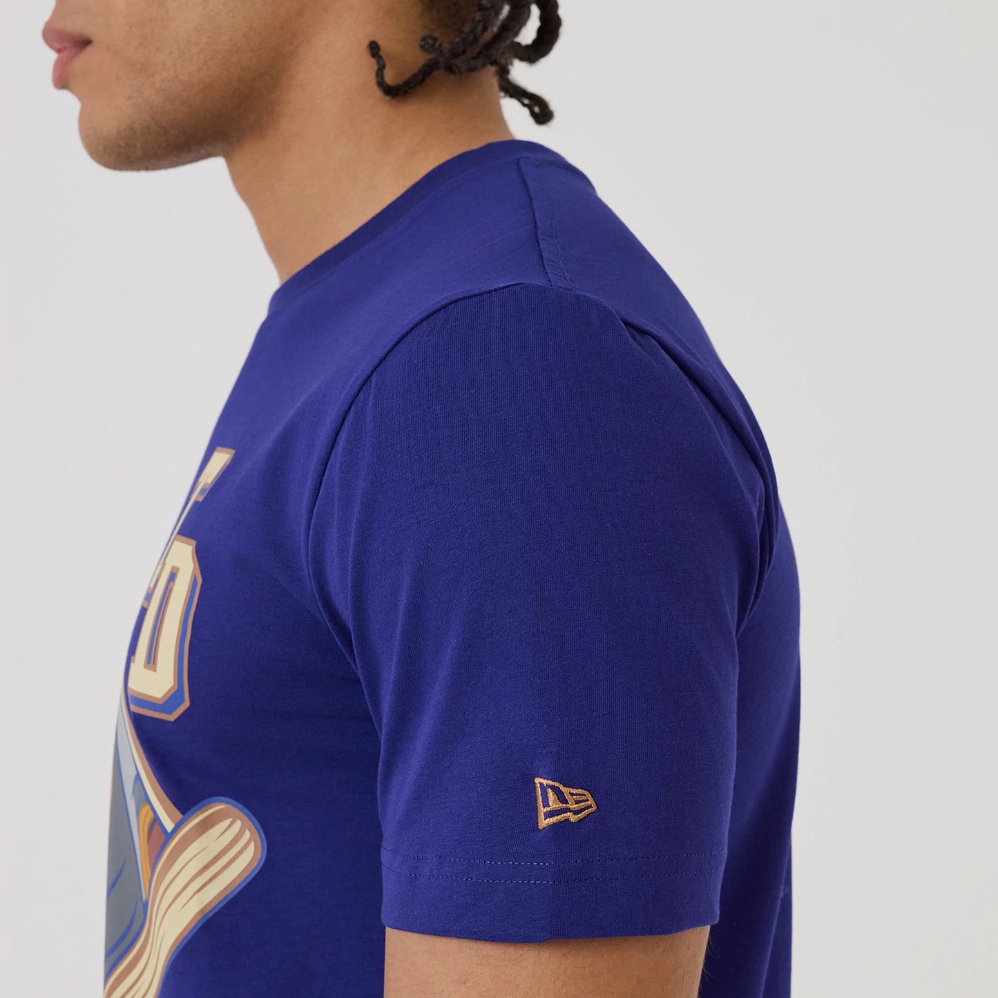 The model is wearing this MLB X Looney Tunes LA Dodgers T-Shirt in dark blue. 5