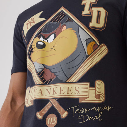 The model is wearing this MLB X Looney Tunes New York Yankees T-Shirt in navy. 3