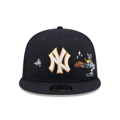 Pictured is this MLB X Looney Tunes Daffy Duck New York Yankees 9FIFTY Snapback Adjustable cap in navy. 3