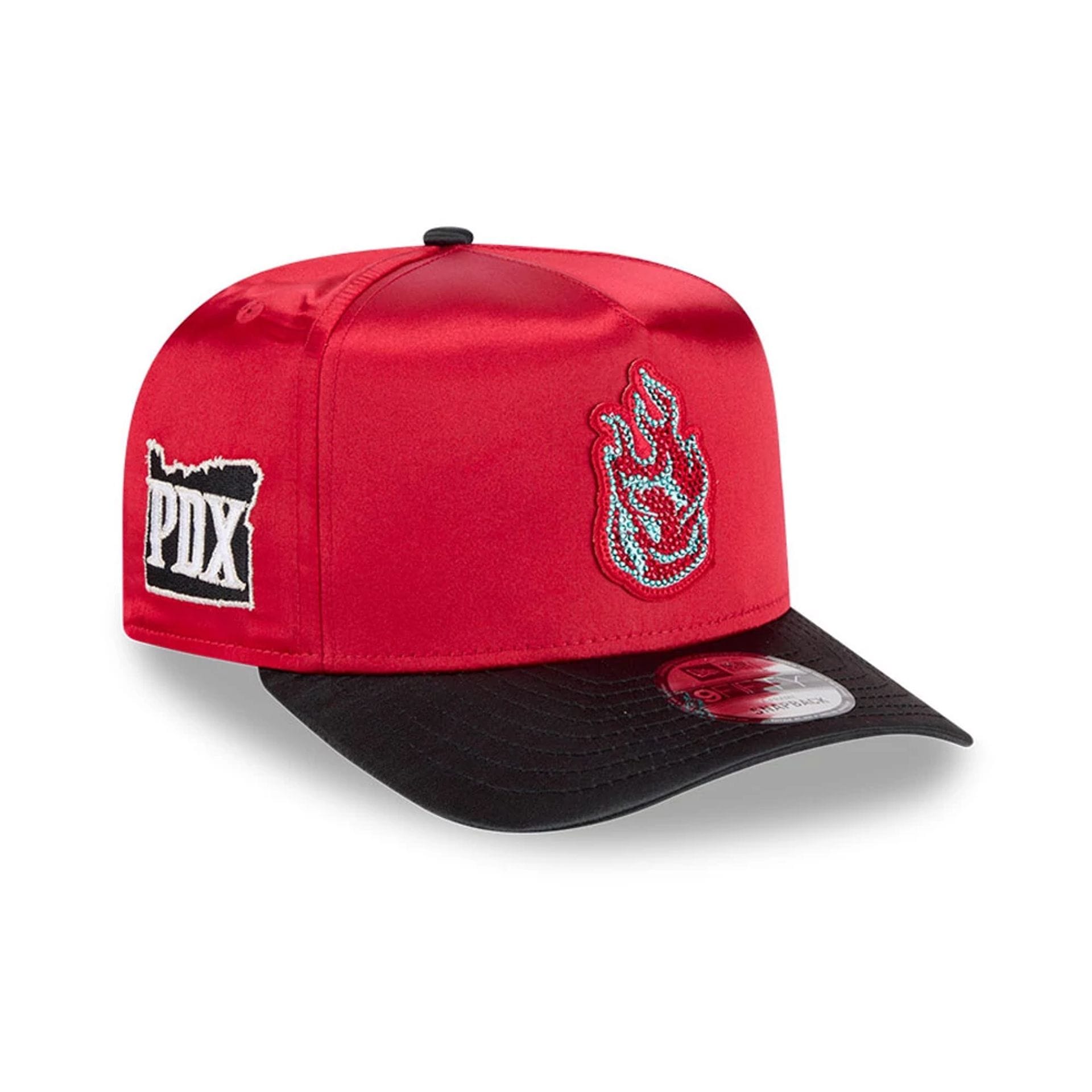 Pictured is this WNBA Draft 2026 Portland Fire 9FIFTY A-Frame Snapback cap in red. 1