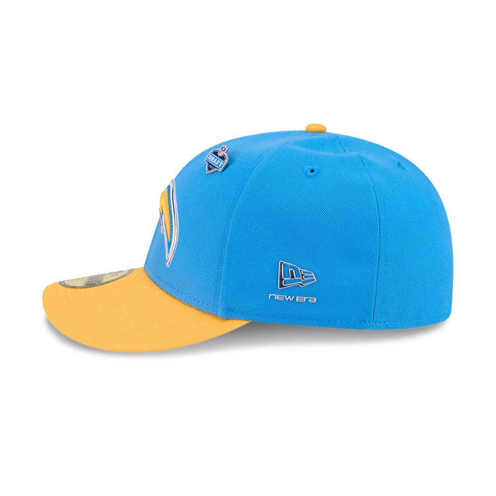LA Chargers NFL Draft 2026 Blue New Era 59FIFTY Fitted Cap, side view showing the blue and white LA Chargers logo embroidered on the front panel, with the blue New Era flag logo on the left side and a contrasting gold visor.