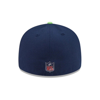 Seattle Seahawks NFL Draft 2026 Dark Blue New Era 59FIFTY Fitted Cap, rear view showing the NFL shield logo embroidered at the centre back of the dark blue structured crown, with a contrasting green top button and matching eyelets.