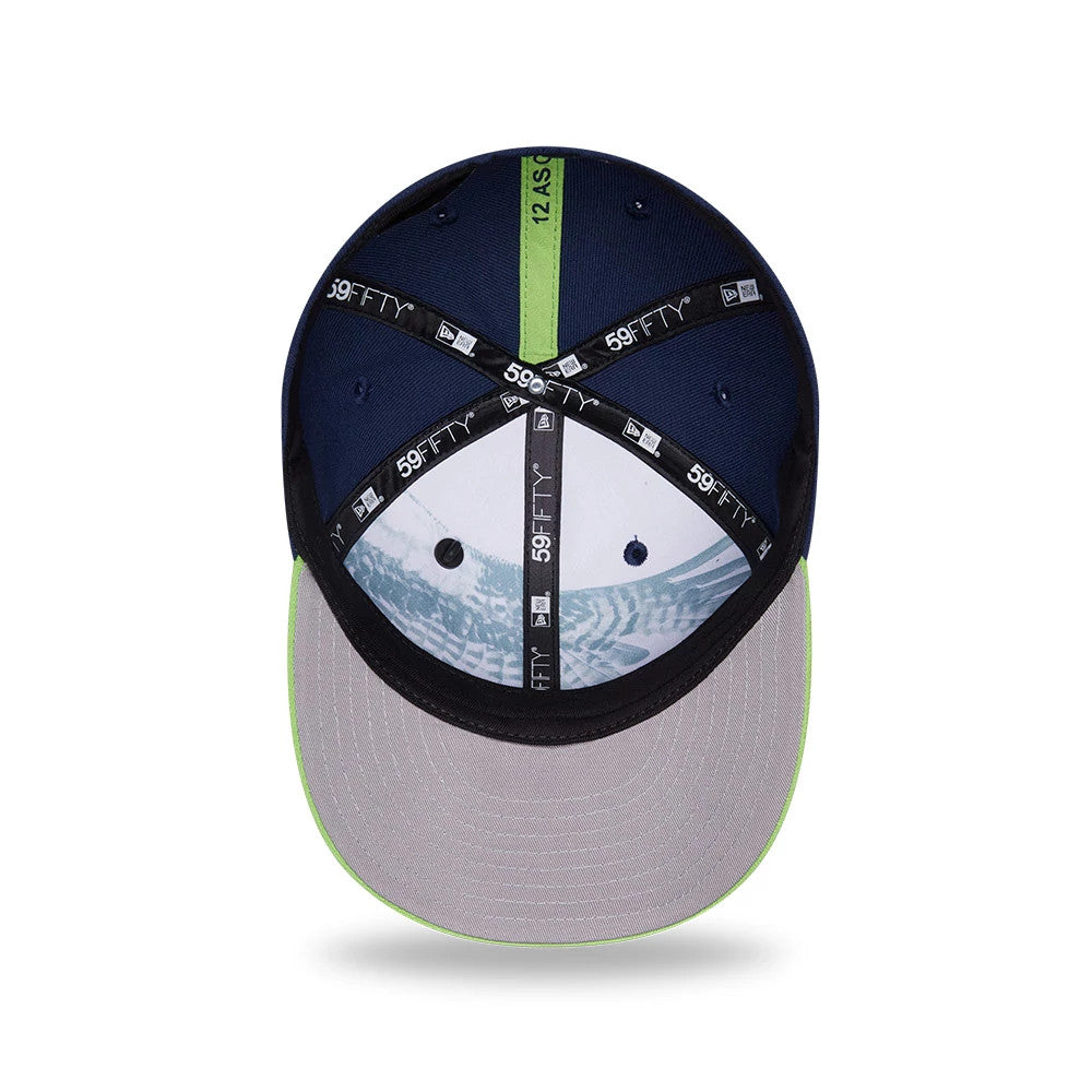 Seattle Seahawks NFL Draft 2026 Dark Blue New Era 59FIFTY Fitted Cap, inside view showing black 59FIFTY taping, a grey undervisor with lime green trim, and a patterned white sweatband, along with the number 12 ASG detail on the crown.