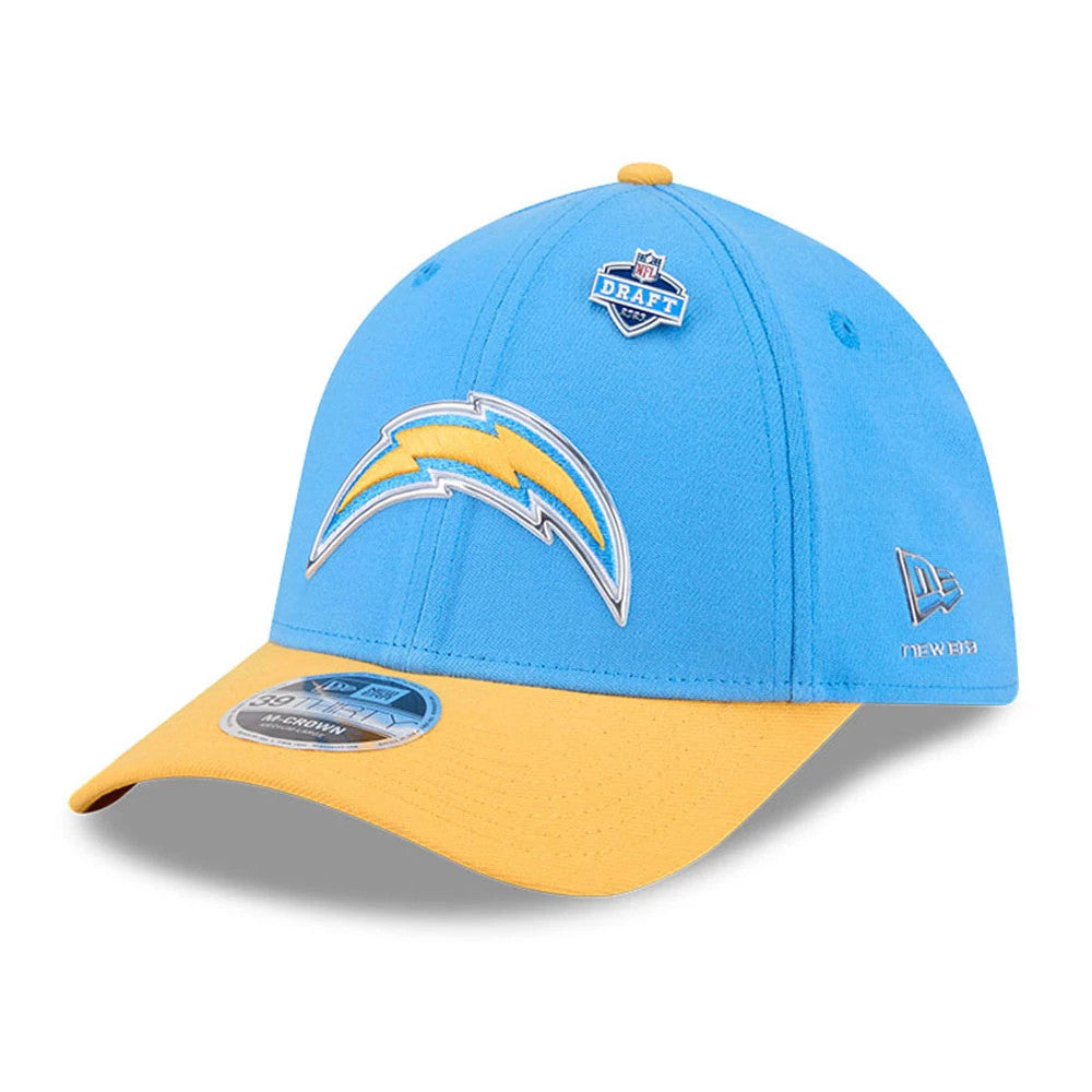 LA Chargers NFL Draft 2026 Blue New Era 39THIRTY M-Crown Stretch Fit Cap, three-quarter view showing the raised yellow and white Chargers logo on the front panel, gold visor with 39THIRTY size sticker, and New Era flag logo on the left side.